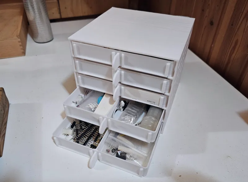 Box items organizer - slots to insert labels