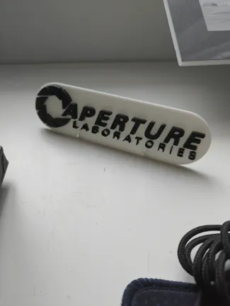 Aperture Science Logo Desk thing