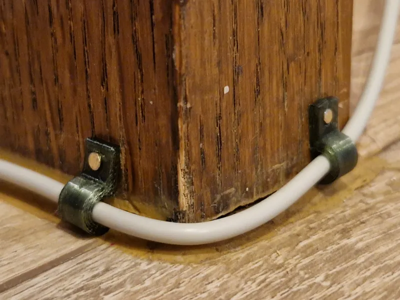 Cable mounting clip with nail