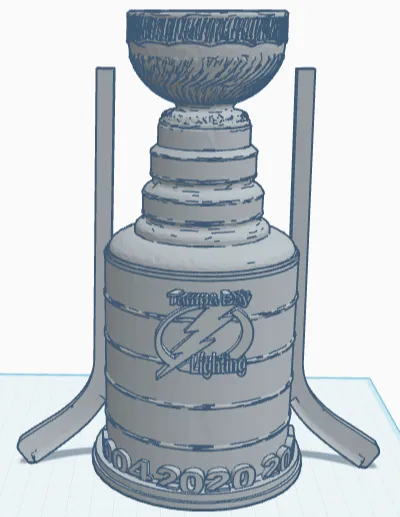 Tampa Bay Lighting Stanley cup with hockey sticks