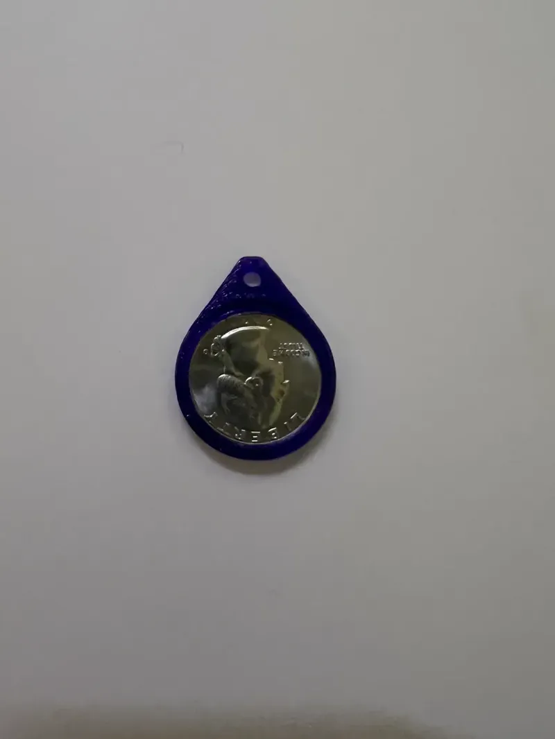 Keyring holder for an American quarter dollar