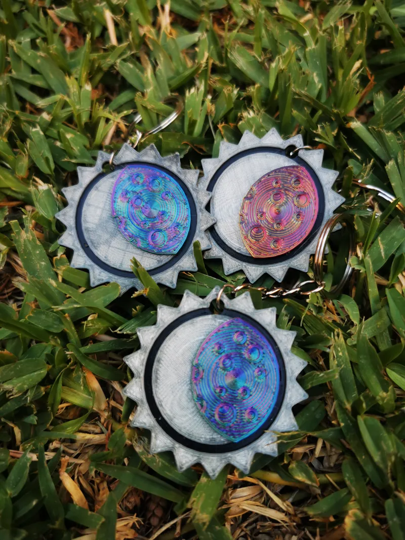 Eclipse keychain and trophy