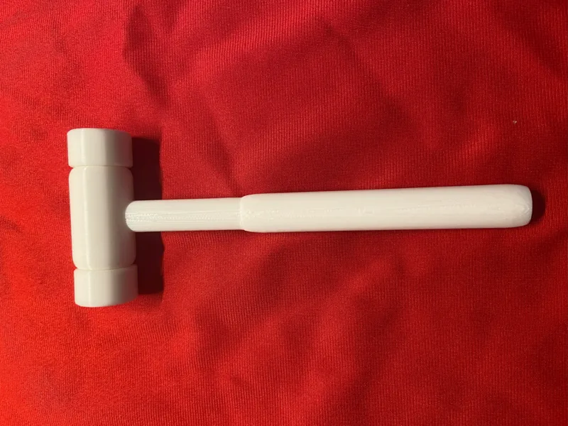 Hammer with interchangeable heads