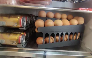 Horizontal stackable egg dispenser