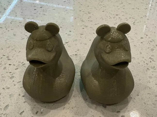 Duck wearing Disney ears