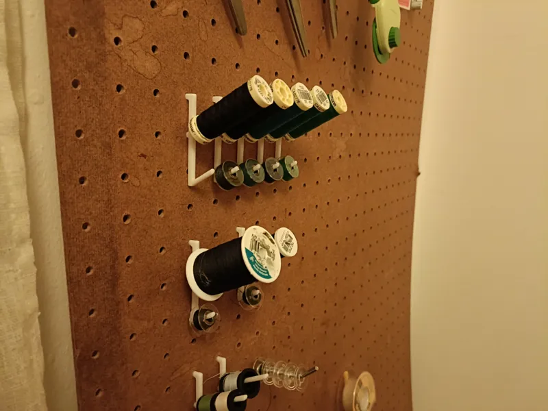 Thread holder for pegboard