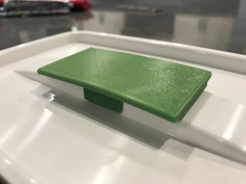 Rev-A-Shelf trash container lid handle
