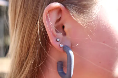 tube-shaped earrings view 2
