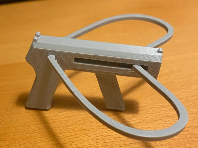 Spring gun