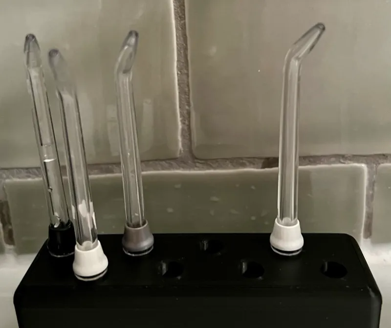 Waterpik brush and tip holder