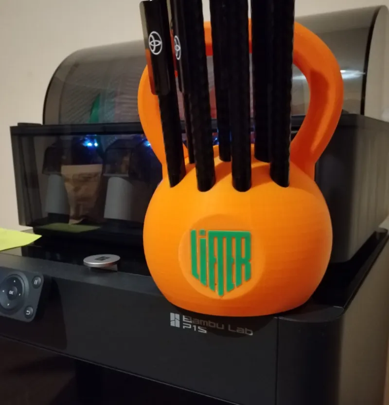 Kettlebell pen holder
