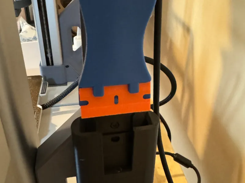 Plastic razor scrapper style mount 
