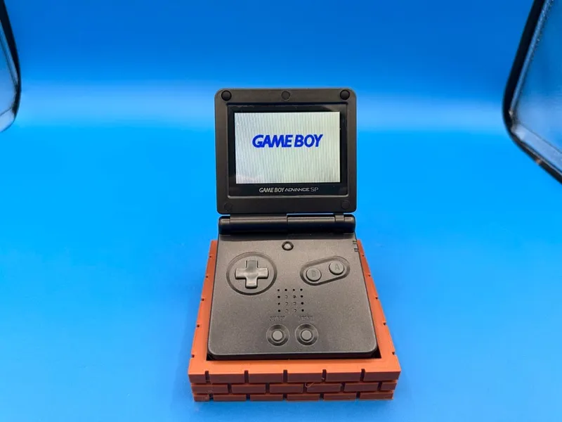 Game Boy Advance SP themed brick display stand