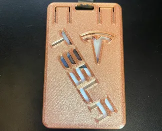 Tesla badge holder