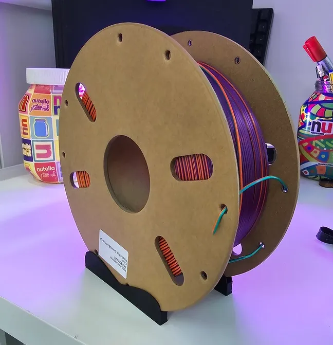 Filament spool holder/stopper