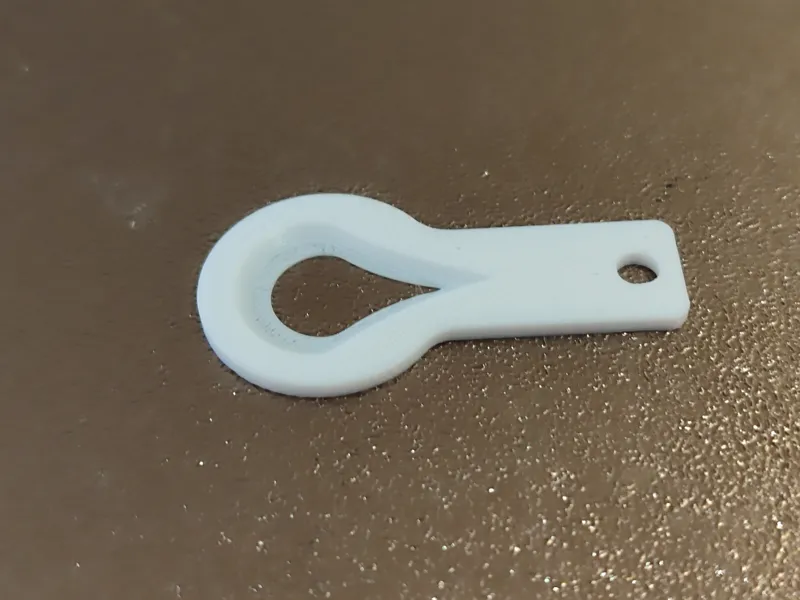 1€ Einkaufswagen Chip Zeckenentferner Anhänger