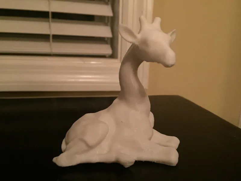 Giraffe Sitting