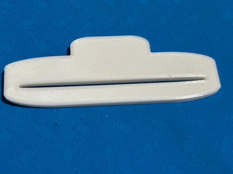 Toothpaste squeezer