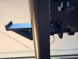 Side mounted headphone holder
