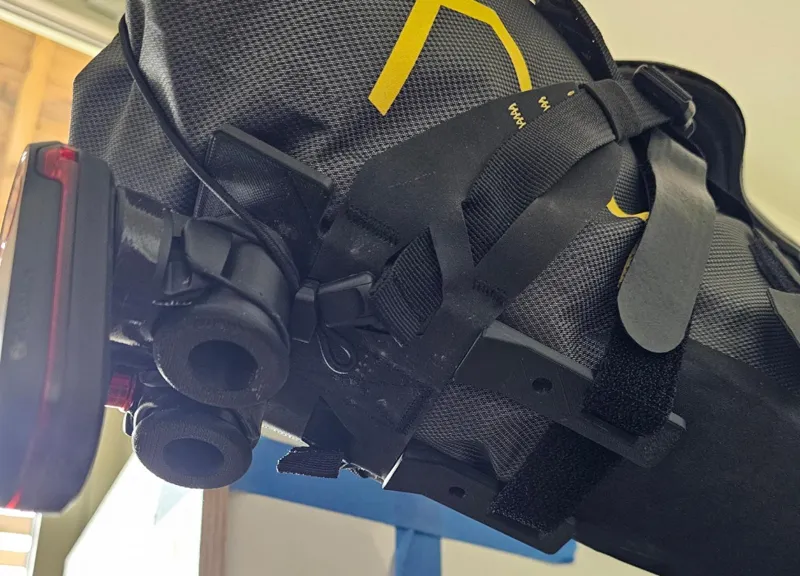 Light mount for Apidura expedition saddle bag