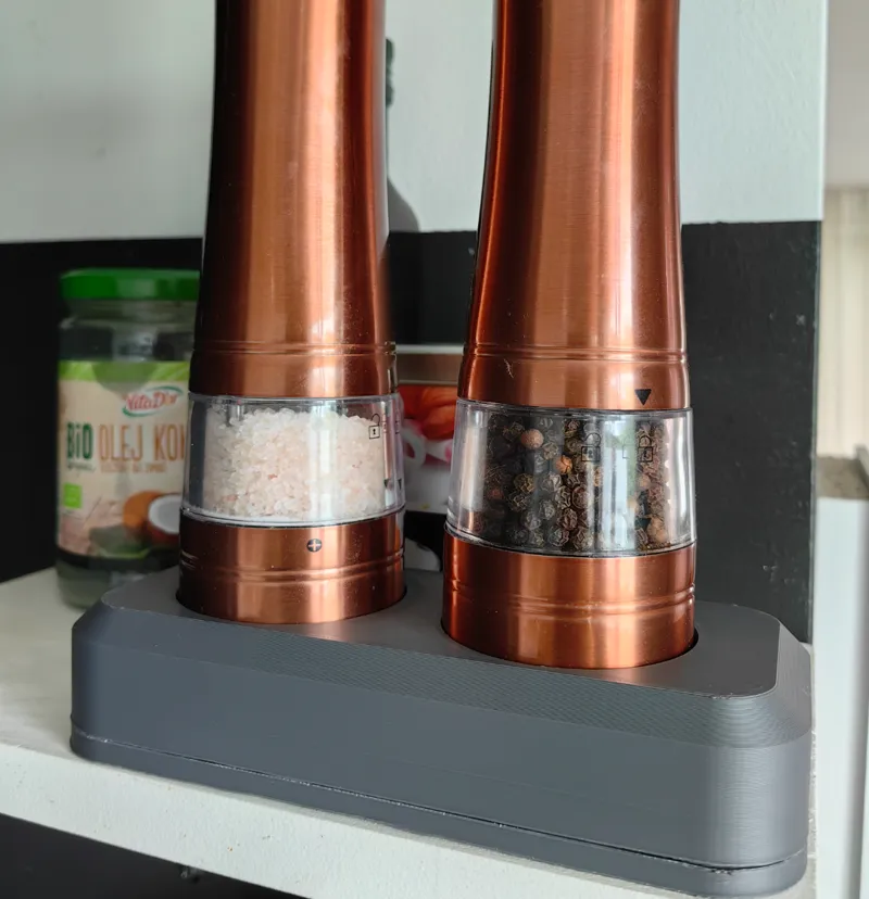 Stand for spice grinders
