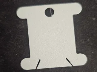 Threads holder