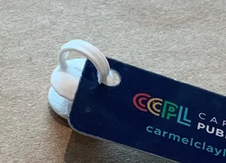 Library card holder shoe charm