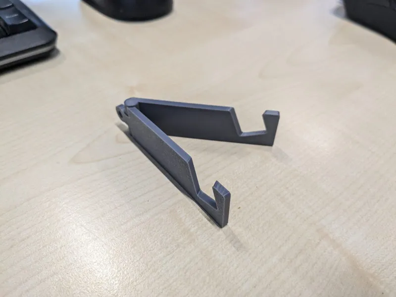 Foldable phone/tablet stand for thicker smartphone