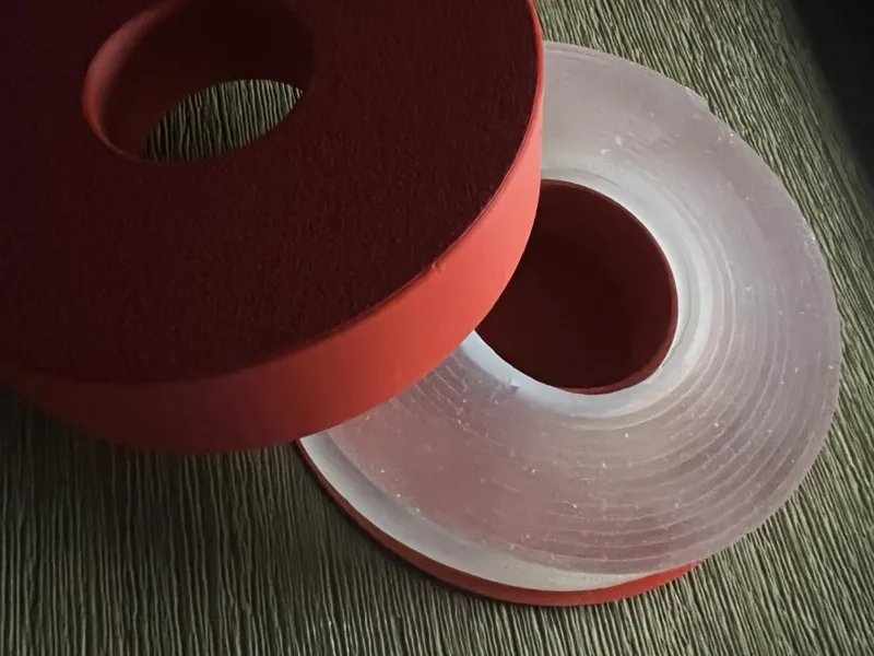 Rubbery double sided tape container