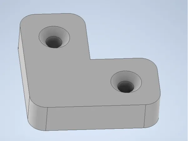 Cale d'angle anti-chute pour boîtes