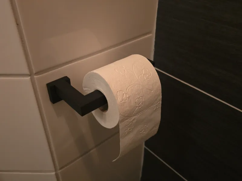 toilet paper holder screw or glue