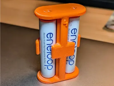 AAA battery case with charge indicator
