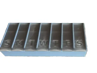 Pillbox With Sliding LIds
