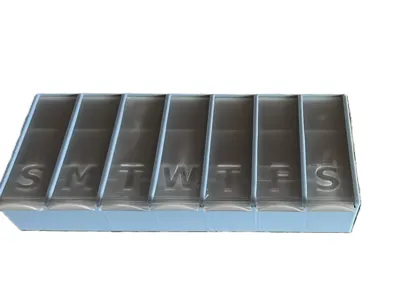 Pillbox With Sliding LIds