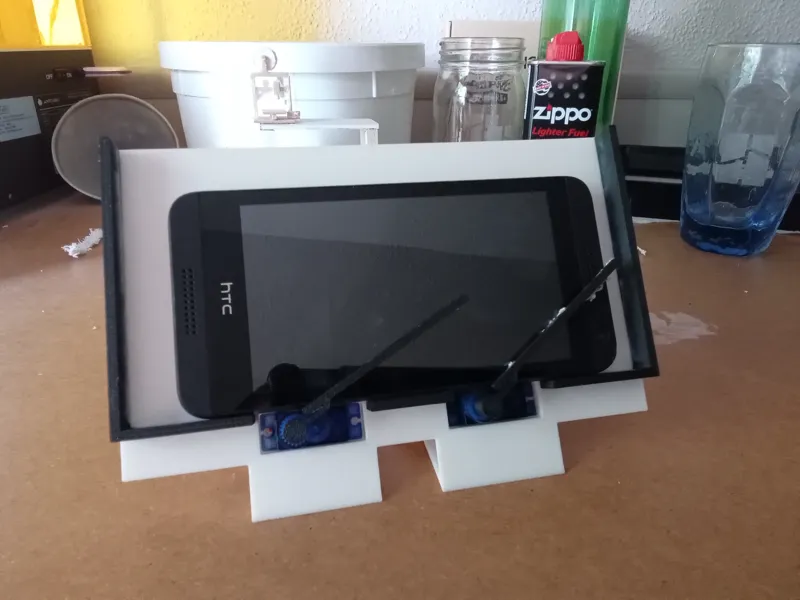 Screen cleaning phone stand 