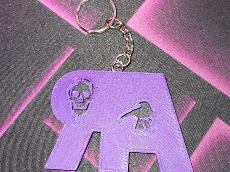 TheRavenArmed Logo Keychain