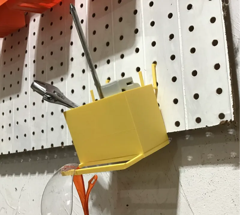 Bucket and hanger for pegboard