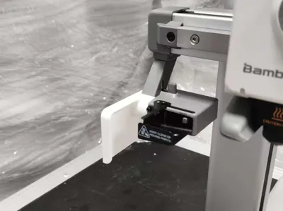 Poop chute, guide plate