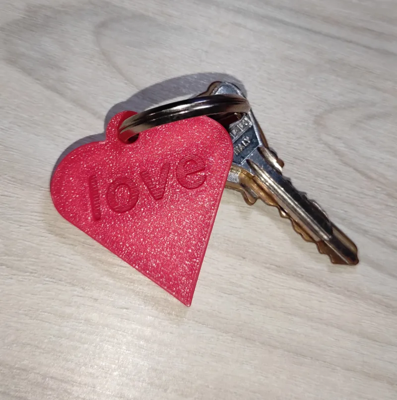 Porta chiavi a forma di cuore con scritta love