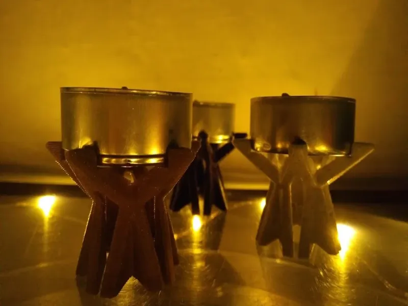 Tea light star candle holder