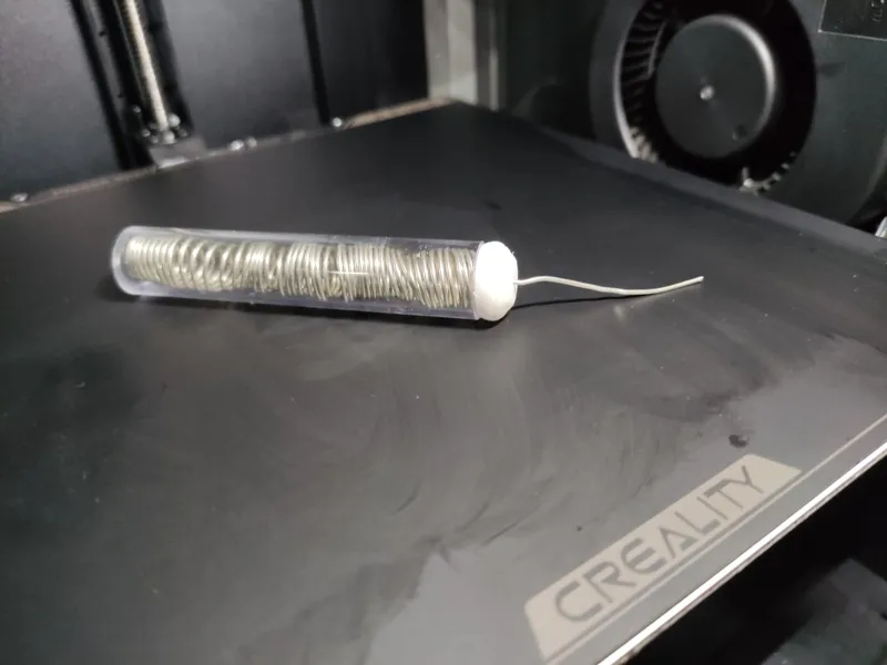 Solder tube cap