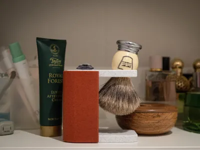 Shaving razor and brush stand