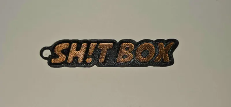 Shit Box Keychain bi color