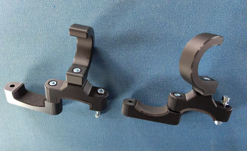 Pushchair clamp with rotating lockable hook