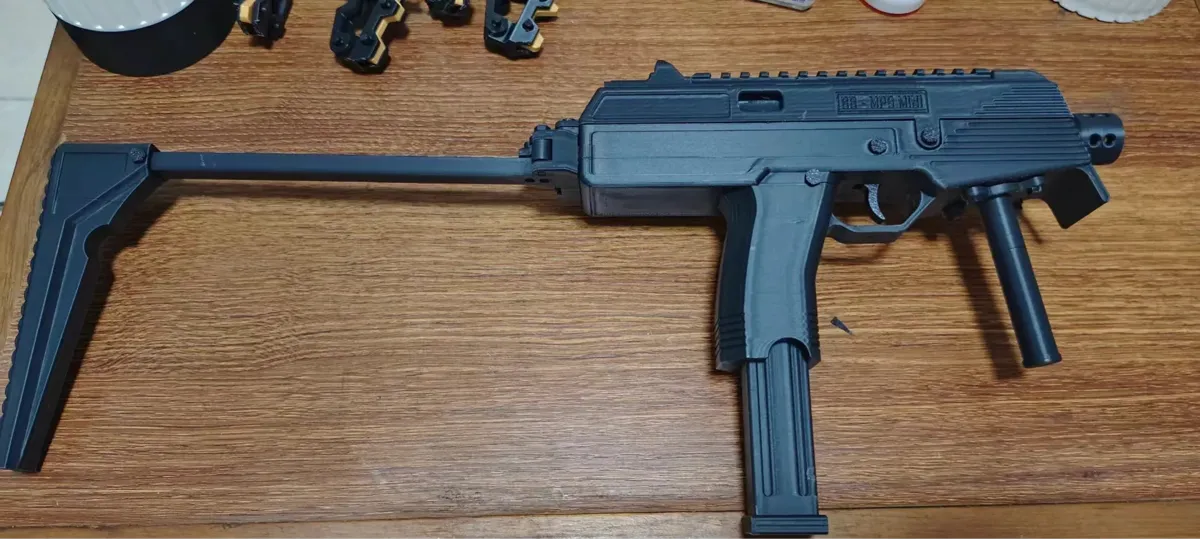 Réplique jouet de pistolet-mitrailleur MP9 miniature (accessoire cosplay)