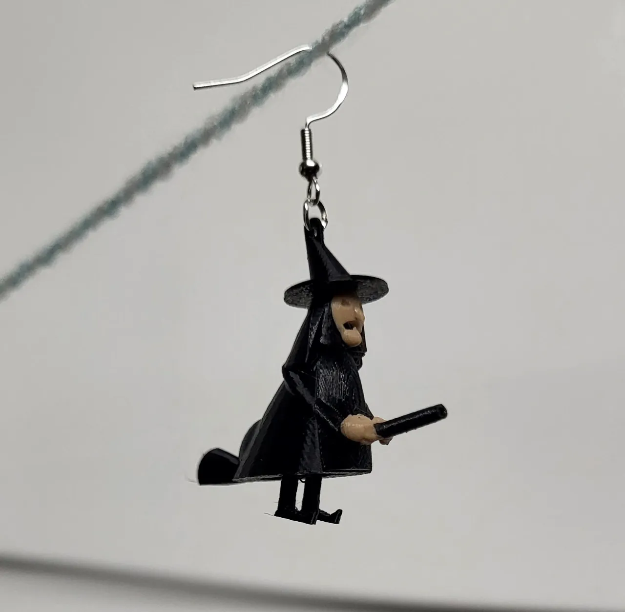 flying witch earring view 2