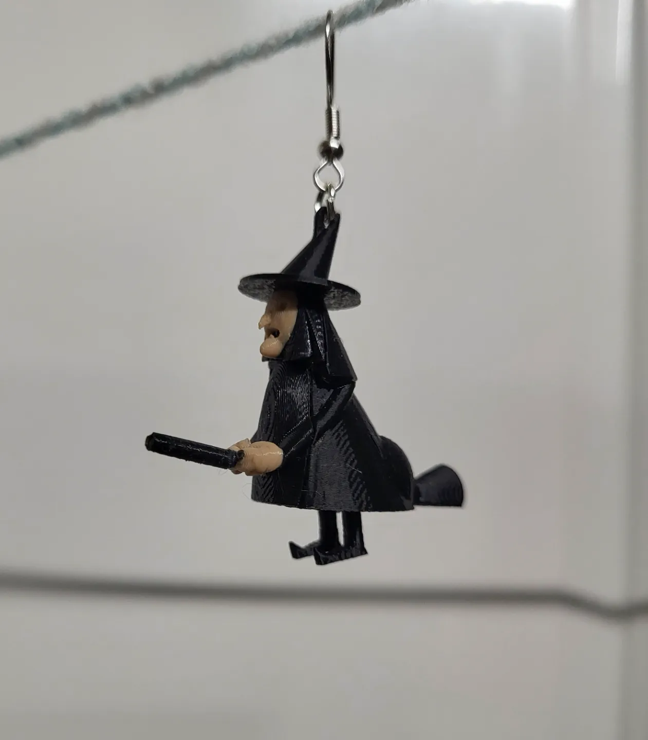 flying witch earring view 4