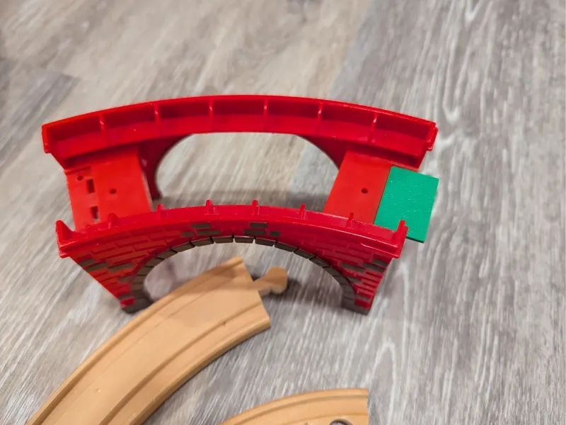Wooden train track bridge overhang piece