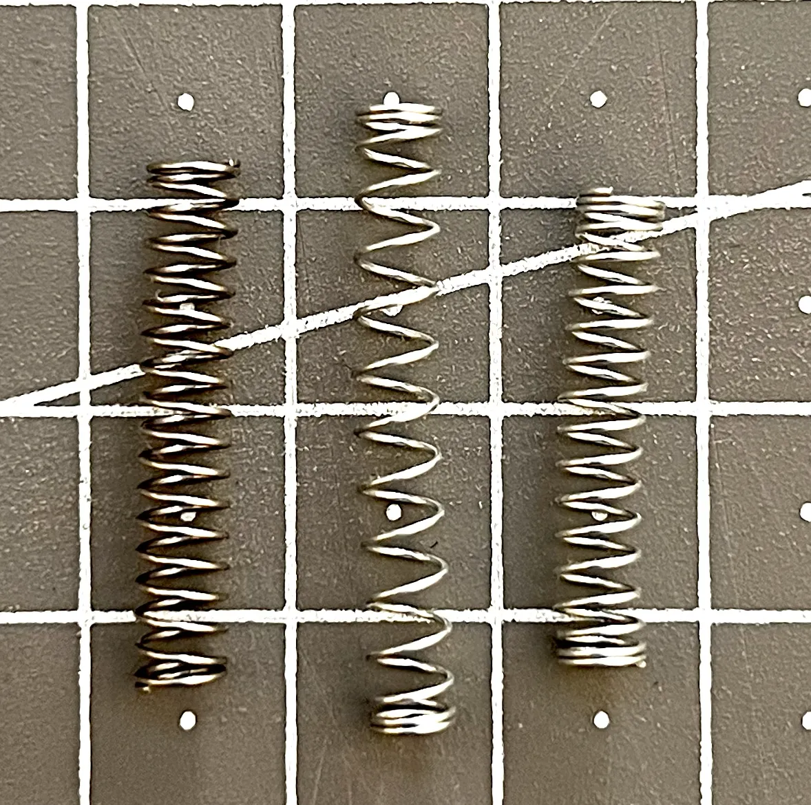 3 pen springs, all different from each other