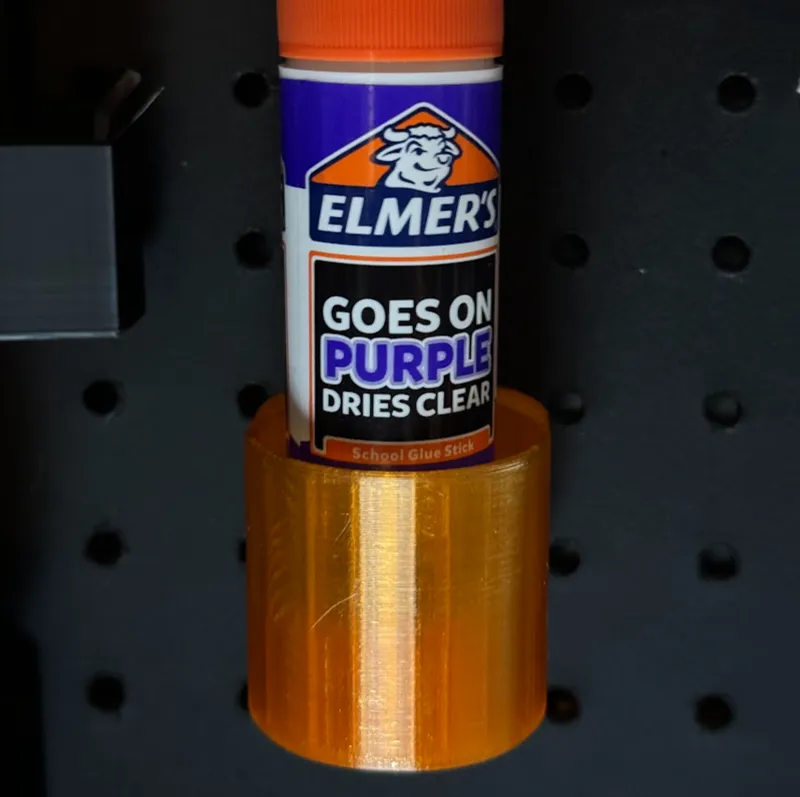 Pegboard glue stick holder